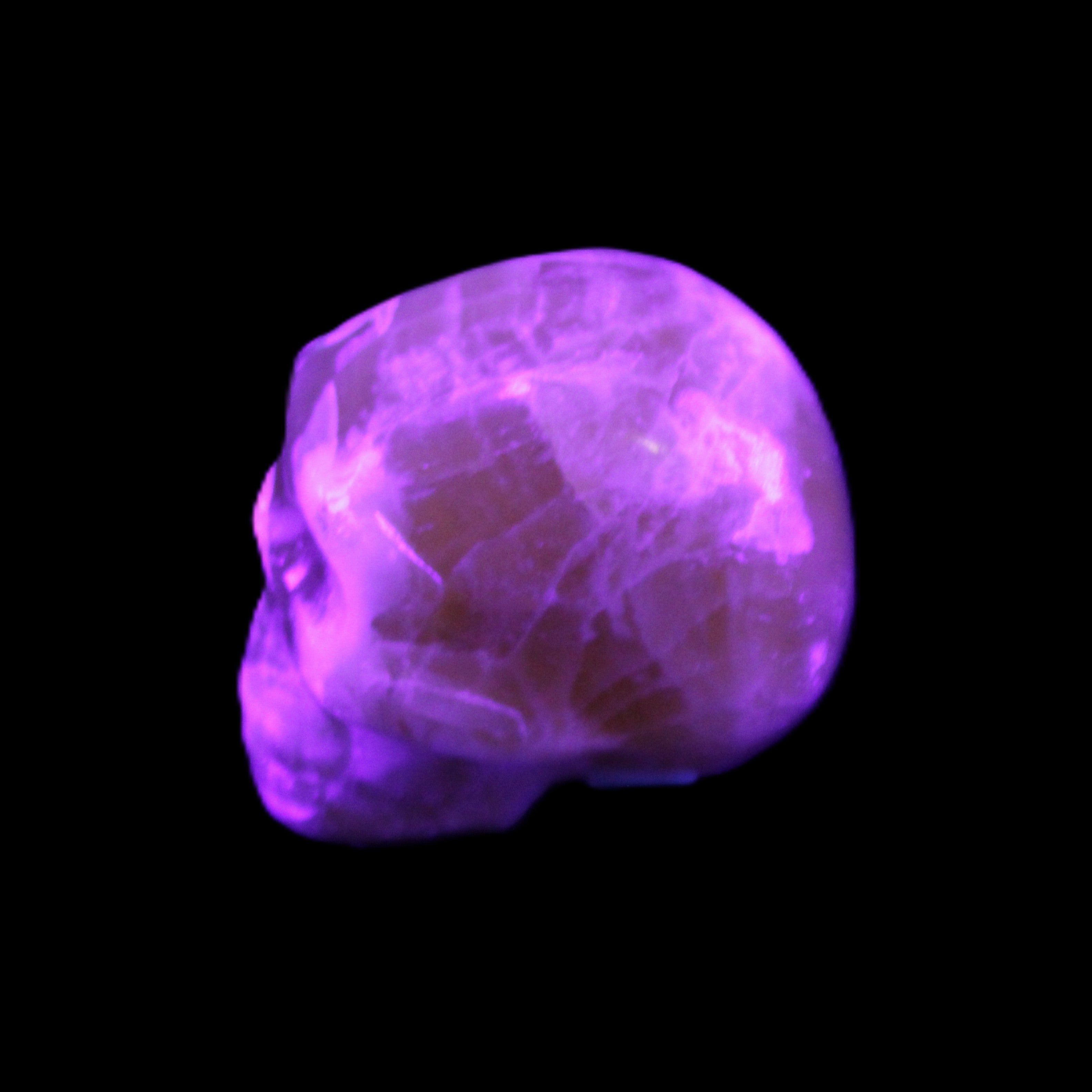 Honey Calcite skull from Pakistan 25*34*33mm 67g in UV light - Rocks and Things Store