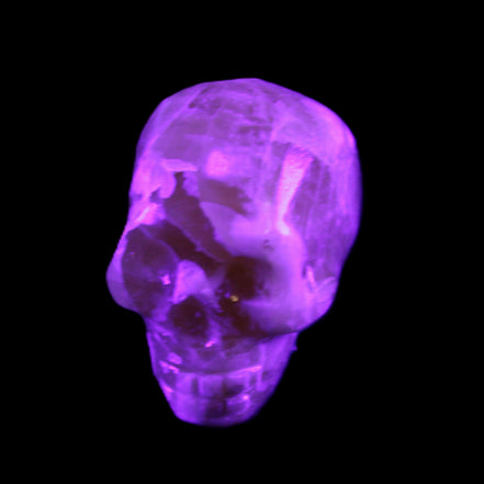 Honey Calcite skull from Pakistan 25*34*33mm 67g in UV light - Rocks and Things Store