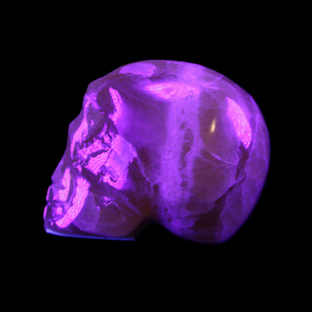 Honey Calcite skull from Pakistan 42*35*37mm 91g in UV light - Rocks and Things Store