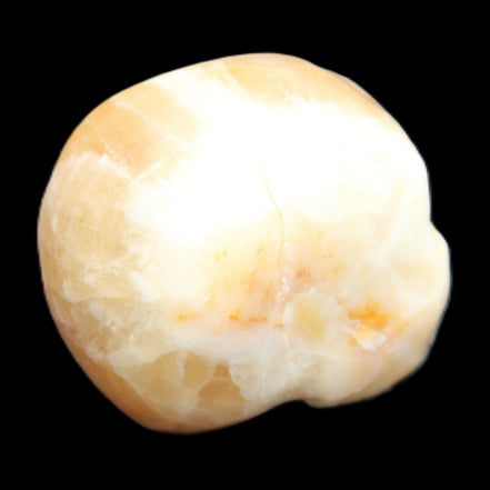 Honey Calcite skull from Pakistan 42*35*37mm 91g in sunlight - Rocks and Things Store