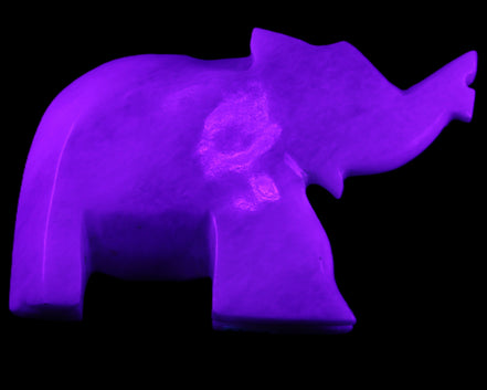 White Jade hand-carved Elephant platter 152*102*21mm 419g in UV light - Rocks and Things Store
