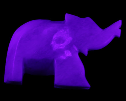 White Jade hand-carved Elephant platter 152*102*21mm 419g in UV light - Rocks and Things Store