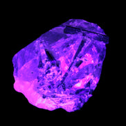 Green Tourmaline crystals on Clear Quartz from Skardu in UV light