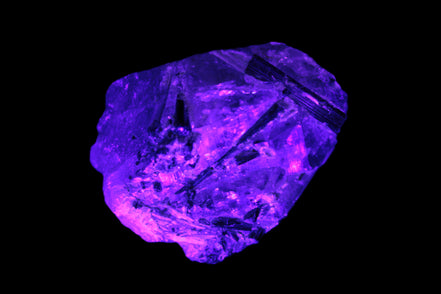 Green Tourmaline crystals on Clear Quartz from Skardu in UV light