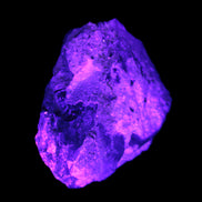 Green Tourmaline crystals on Clear Quartz from Skardu in UV light