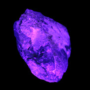 Green Tourmaline crystals on Clear Quartz from Skardu in UV light