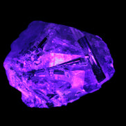 Green Tourmaline crystals on Clear Quartz from Skardu in UV light