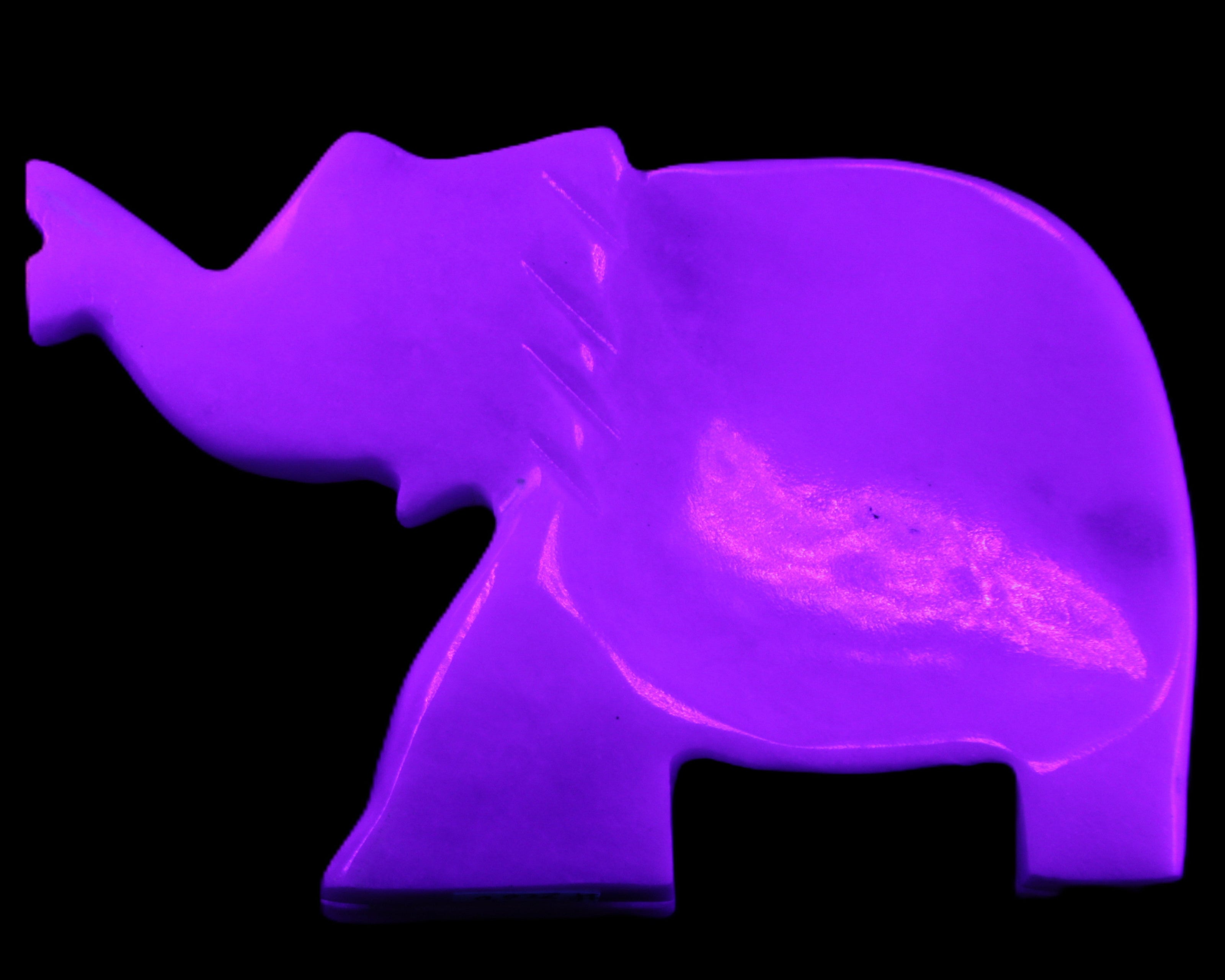 White Jade hand-carved Elephant platter 149*100*24mm 458g in UV light - Rocks and Things Store