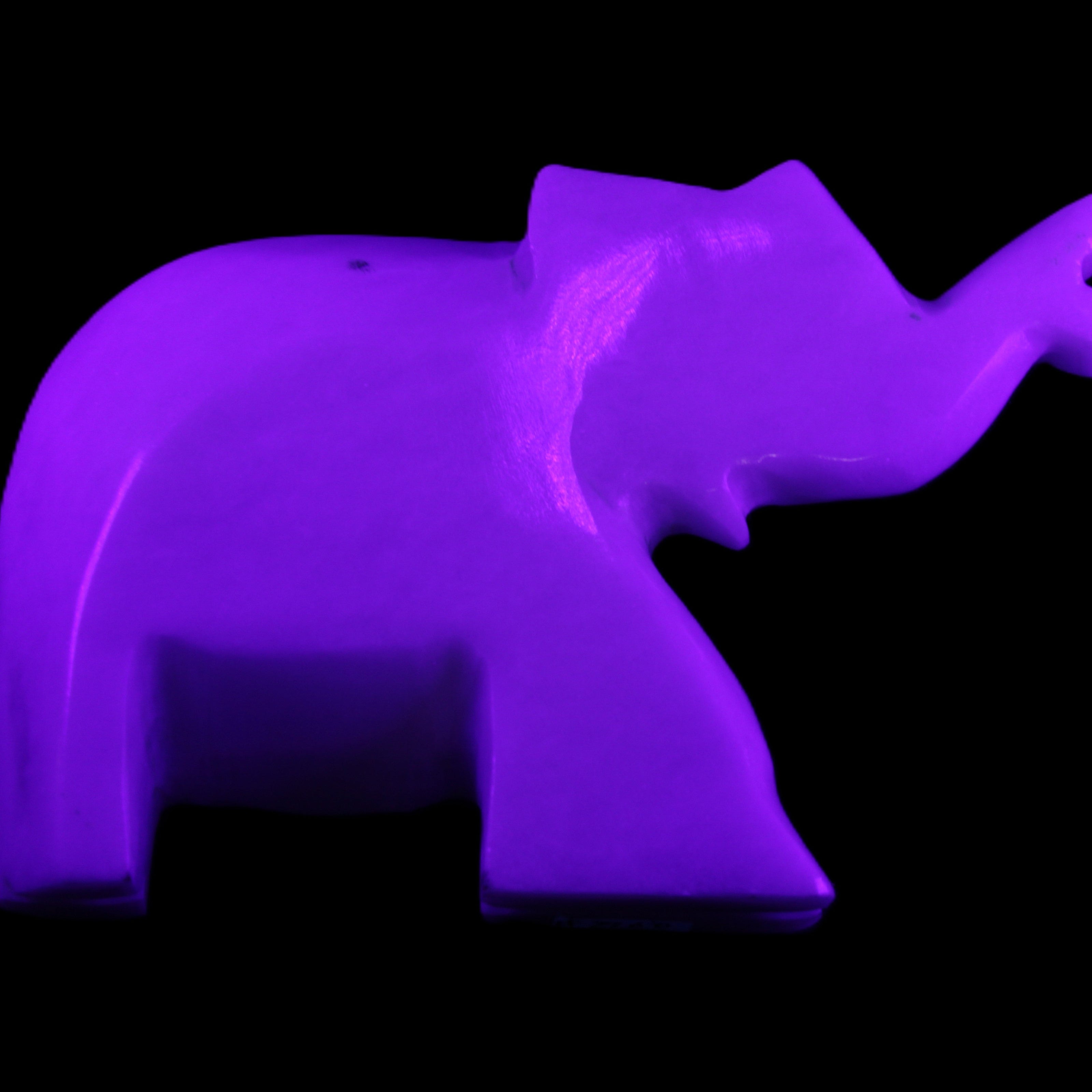 White Jade hand-carved Elephant platter 149*100*24mm 458g in UV light - Rocks and Things Store