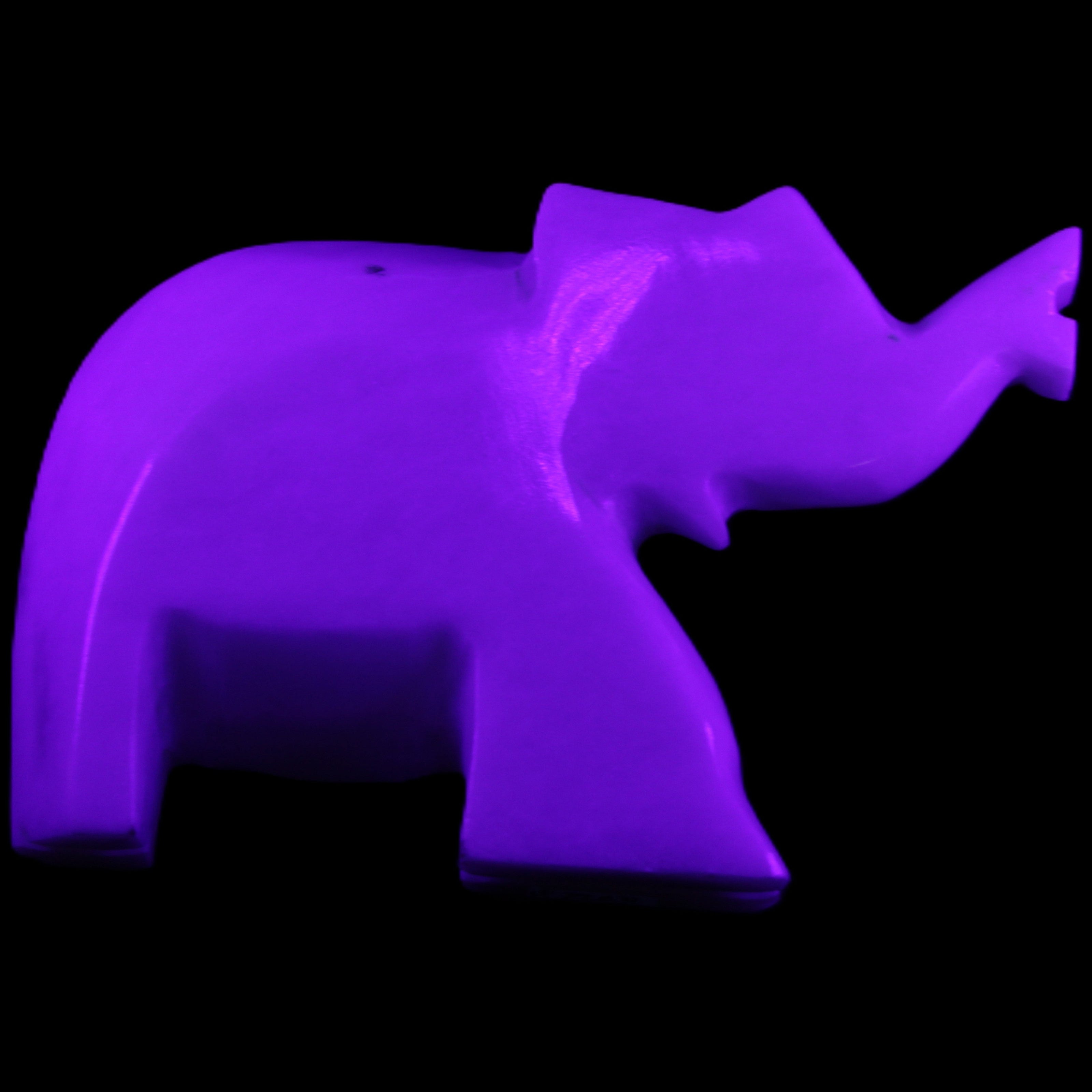 White Jade hand-carved Elephant platter 149*100*24mm 458g in UV light - Rocks and Things Store
