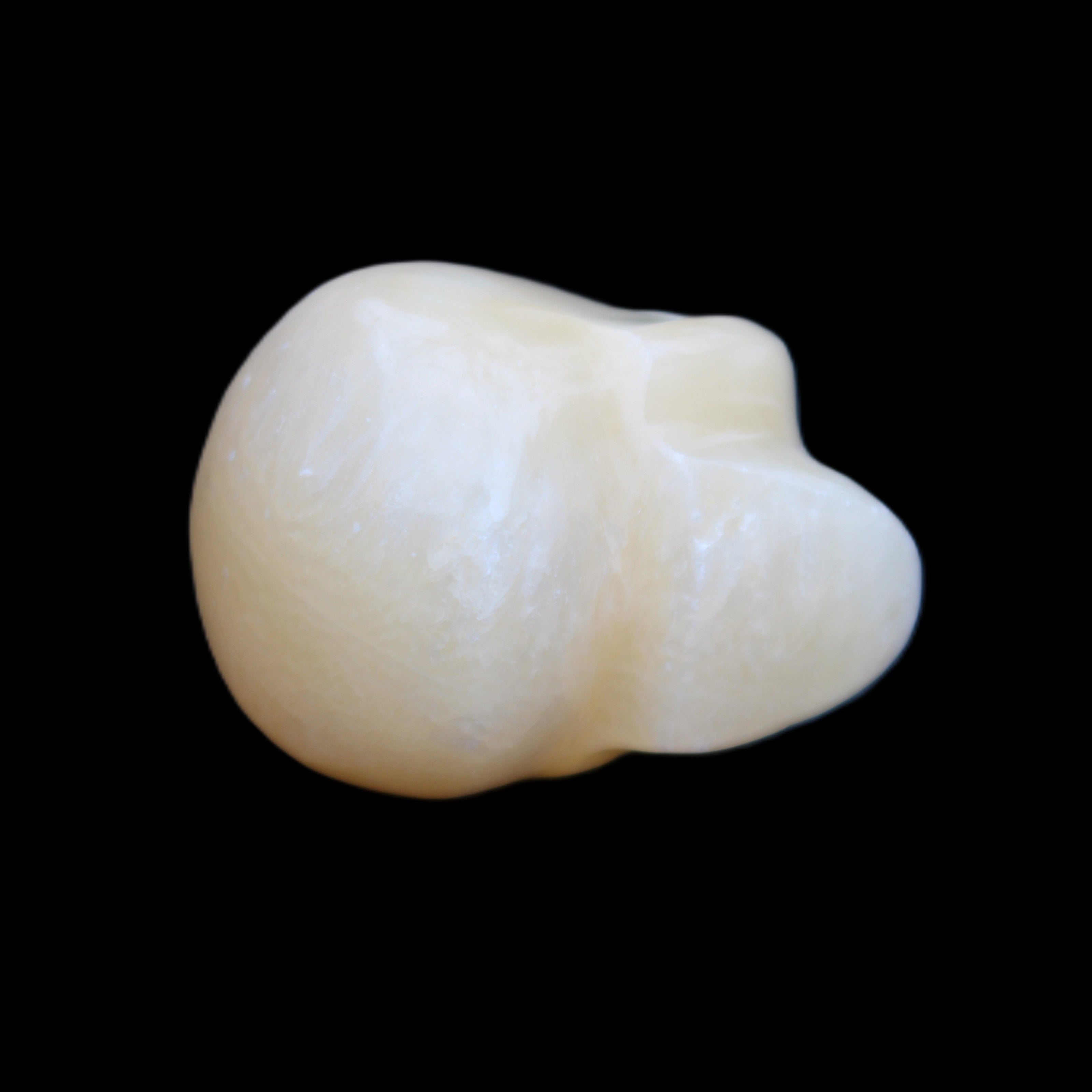 Lemon Calcite skull 33*46*37mm 94g in sunlight - Rocks and Things Store