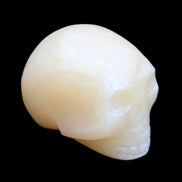 Lemon Calcite skull 33*46*37mm 94g in sunlight - Rocks and Things Store
