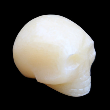 Lemon Calcite skull 33*46*37mm 94g in sunlight - Rocks and Things Store