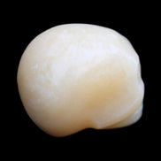 Lemon Calcite skull 33*46*37mm 94g in sunlight - Rocks and Things Store
