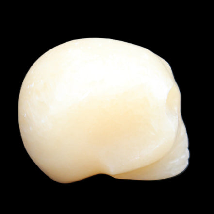 Lemon Calcite skull 33*46*37mm 94g in sunlight - Rocks and Things Store