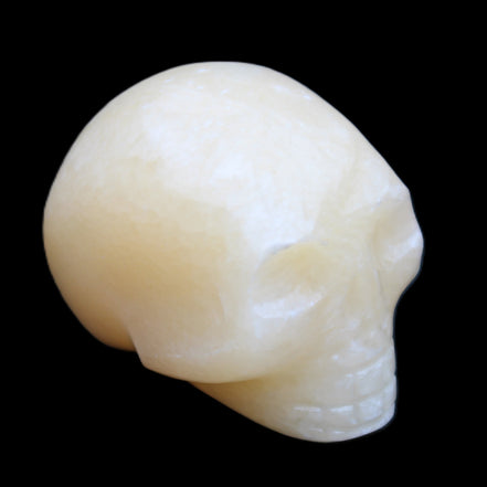 Lemon Calcite skull 33*46*37mm 94g in sunlight - Rocks and Things Store