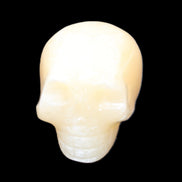 Lemon Calcite skull 33*46*37mm 94g in sunlight - Rocks and Things Store