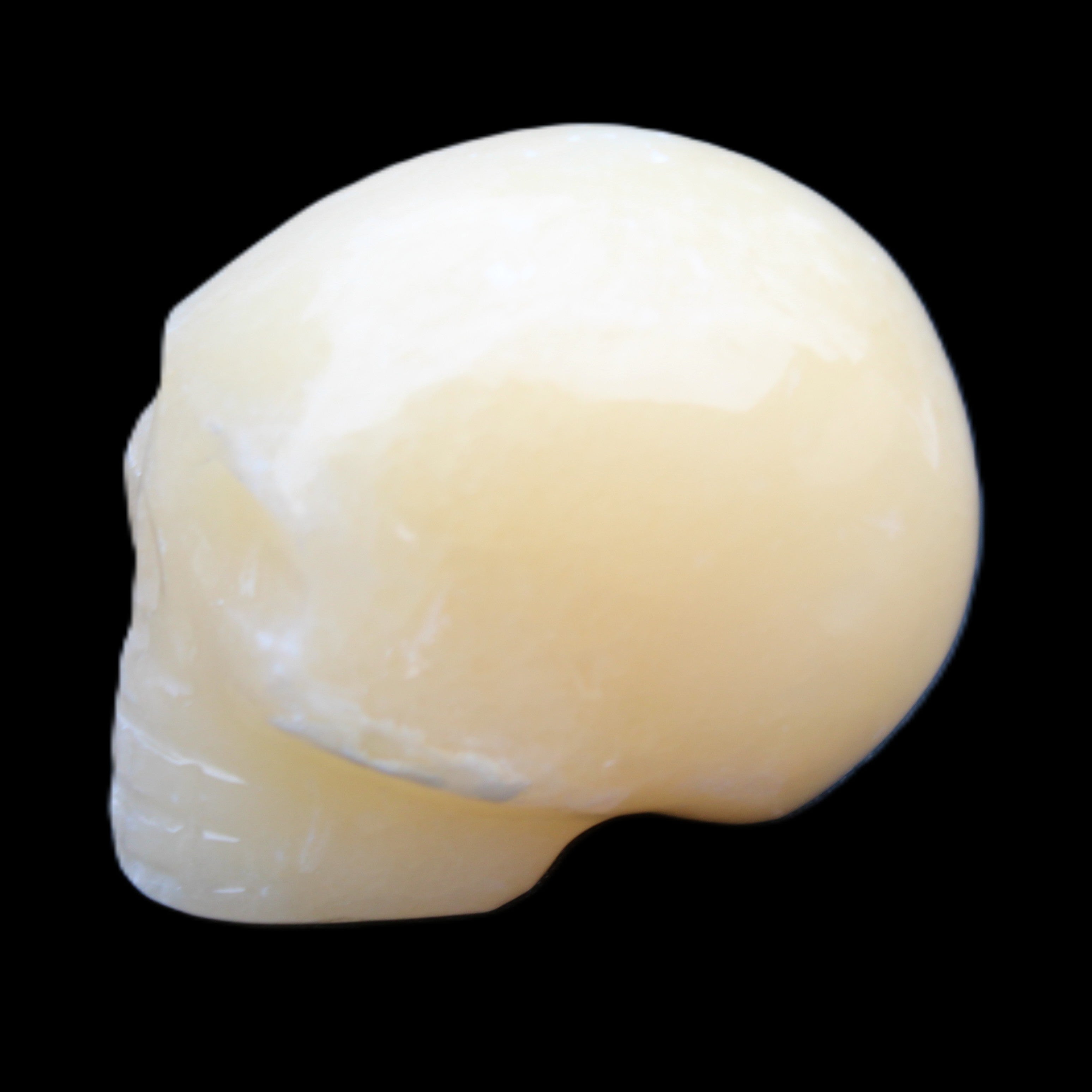 Lemon Calcite skull 33*46*37mm 94g in sunlight - Rocks and Things Store