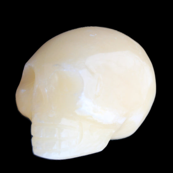 Lemon Calcite skull 33*46*37mm 94g in sunlight - Rocks and Things Store