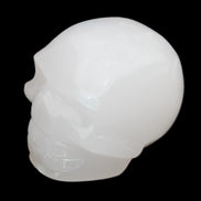Mangano Calcite skull 45*52*48mm 196g in sunlight - Rocks and Things Store
