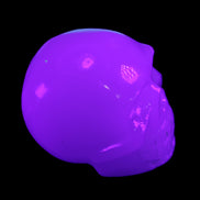 Mangano Calcite skull 45*52*48mm 196g in UV light - Rocks and Things Store