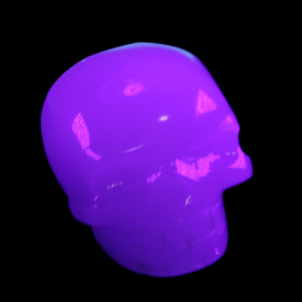 Mangano Calcite skull 45*52*48mm 196g in UV light - Rocks and Things Store