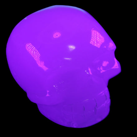Mangano Calcite skull 45*52*48mm 196g in UV light - Rocks and Things Store