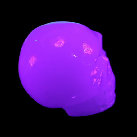 Mangano Calcite skull 45*52*48mm 196g in UV light - Rocks and Things Store