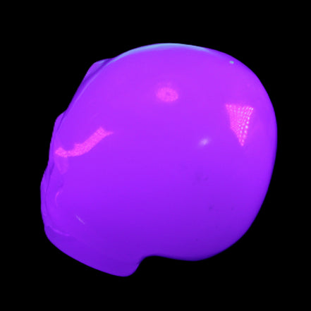 Mangano Calcite skull 45*52*48mm 196g in UV light - Rocks and Things Store