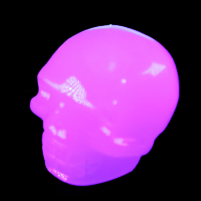 Mangano Calcite skull 45*52*48mm 196g in UV light - Rocks and Things Store