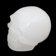 Mangano Calcite skull 45*52*48mm 196g in sunlight - Rocks and Things Store