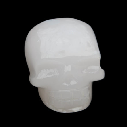 Mangano Calcite skull 45*52*48mm 196g in sunlight - Rocks and Things Store