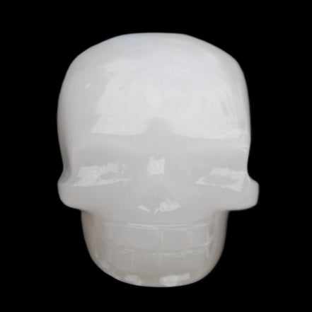 Mangano Calcite skull 45*52*48mm 196g in sunlight - Rocks and Things Store