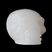 Mangano Calcite skull 45*52*48mm 196g in sunlight - Rocks and Things Store