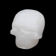 Mangano Calcite skull 45*52*48mm 196g in sunlight - Rocks and Things Store