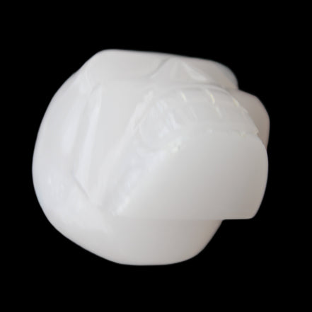 Mangano Calcite skull 45*52*48mm 196g in sunlight - Rocks and Things Store