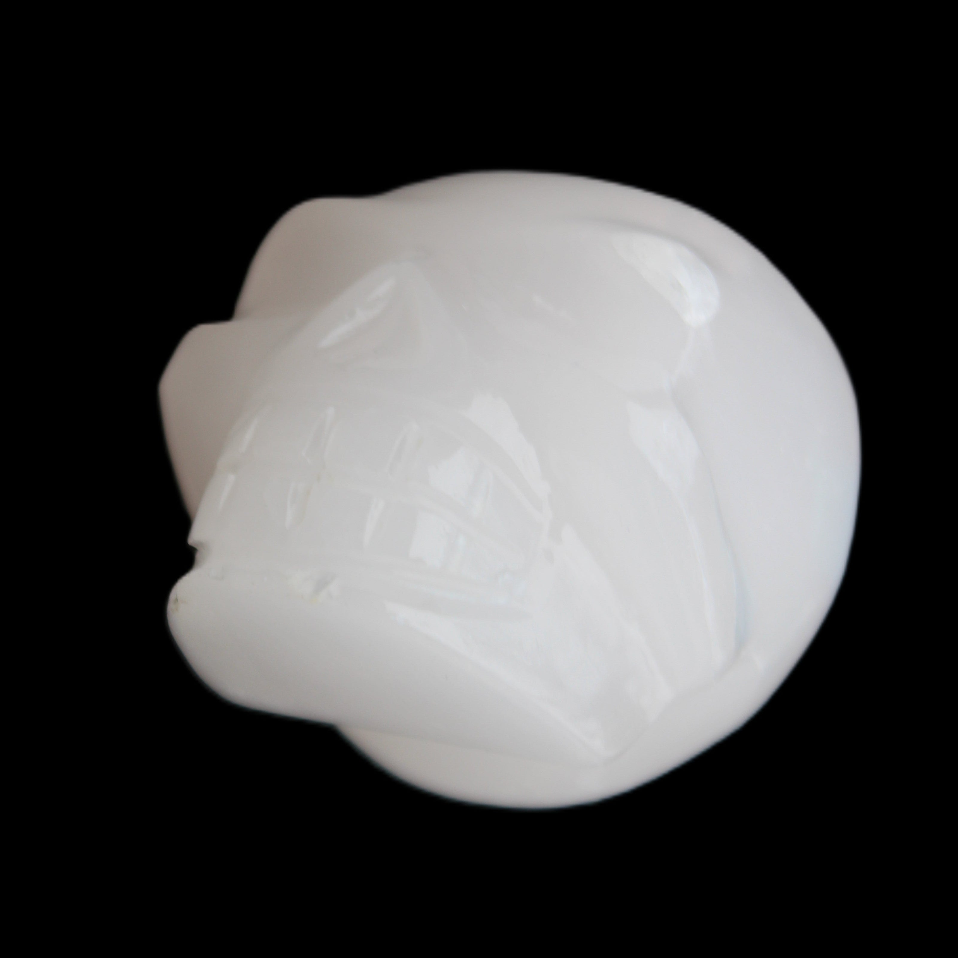 Mangano Calcite skull 45*52*48mm 196g in sunlight - Rocks and Things Store