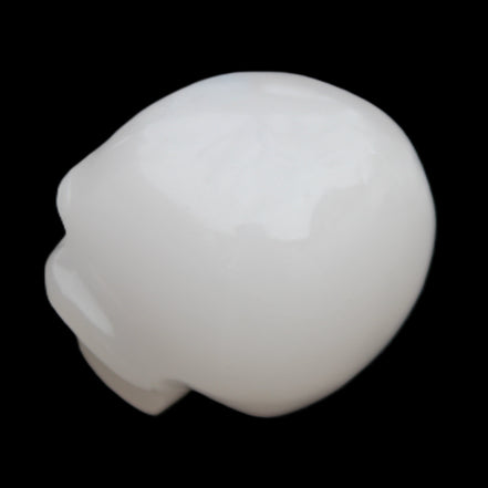 Mangano Calcite skull 45*52*48mm 196g in sunlight - Rocks and Things Store