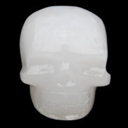 Mangano Calcite skull 45*52*48mm 196g in sunlight - Rocks and Things Store