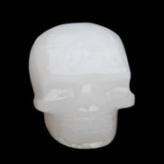 Mangano Calcite skull 45*52*48mm 196g in sunlight - Rocks and Things Store