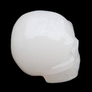 Mangano Calcite skull 45*52*48mm 196g in sunlight - Rocks and Things Store