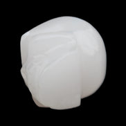 Mangano Calcite skull 45*52*48mm 196g in sunlight - Rocks and Things Store