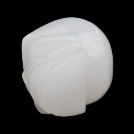 Mangano Calcite skull 45*52*48mm 196g in sunlight - Rocks and Things Store