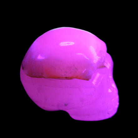 Mangano Calcite skull 38*55*48mm 167g in UV light - Rocks and Things Store