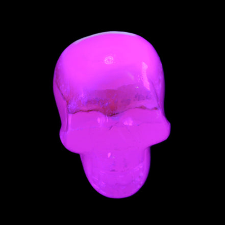 Mangano Calcite skull 38*55*48mm 167g in UV light - Rocks and Things Store