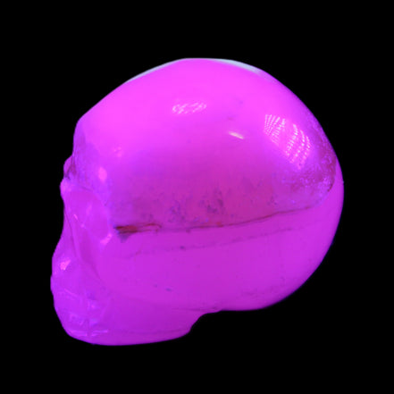 Mangano Calcite skull 38*55*48mm 167g in UV light - Rocks and Things Store