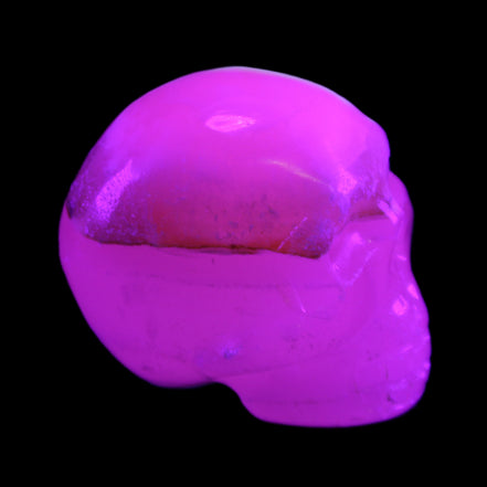 Mangano Calcite skull 38*55*48mm 167g in UV light - Rocks and Things Store