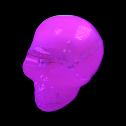 Mangano Calcite skull 38*55*48mm 167g in UV light - Rocks and Things Store