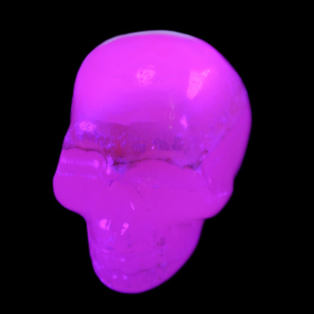Mangano Calcite skull 38*55*48mm 167g in UV light - Rocks and Things Store