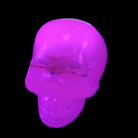 Mangano Calcite skull 38*55*48mm 167g in sunlight - Rocks and Things Store